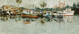 River Boats Docked In A Small Harbor